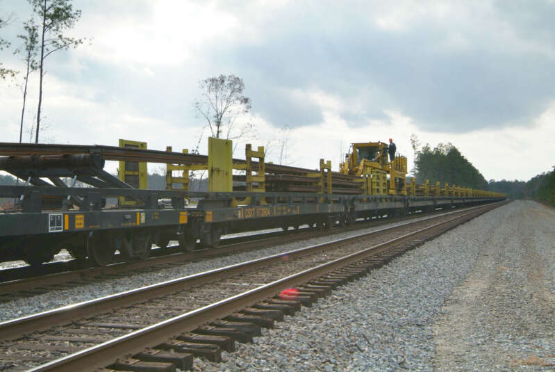 Loading train for multi-layer rail transport