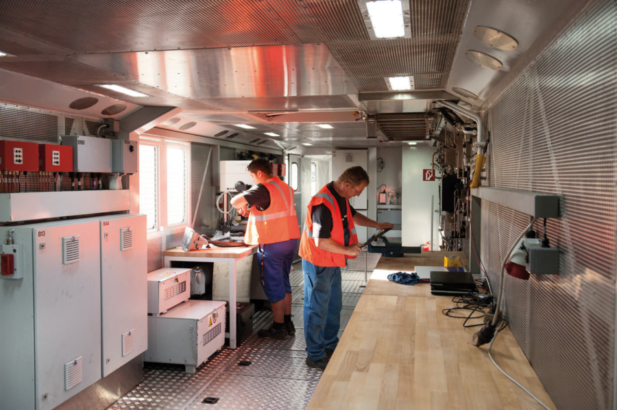 Preparation works can be performed in the large workshop room of the machine while travelling to the work site. The machine also has a loading room for material and tools.